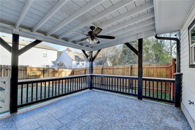 view of patio featuring ceiling fan