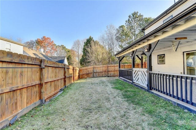 view of yard featuring ceiling fan