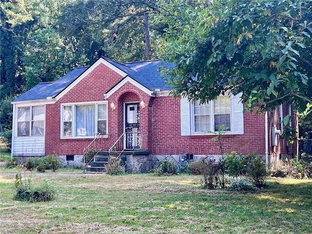 view of front of home with a front yard