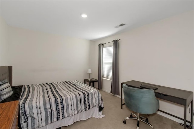 bedroom with visible vents, baseboards, and carpet flooring