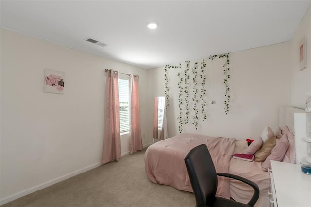 bedroom with visible vents, baseboards, recessed lighting, and light carpet
