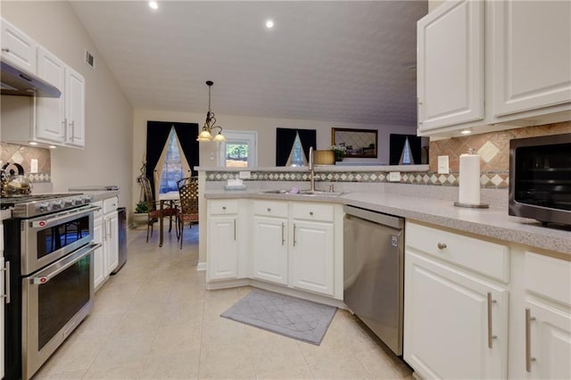 kitchen featuring a sink, light countertops, white cabinets, and stainless steel appliances