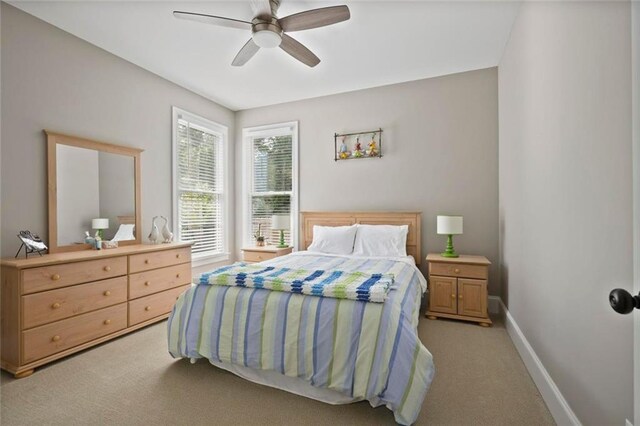 6317 Benbrooke Overlook NW, Acworth, GA 30101 - bedroom with light colored carpet and ceiling fan