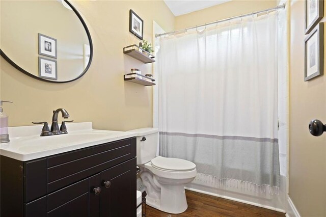 6317 Benbrooke Overlook NW, Acworth, GA 30101 - bathroom with vanity, wood finished floors, and shower / bath combination with curtain