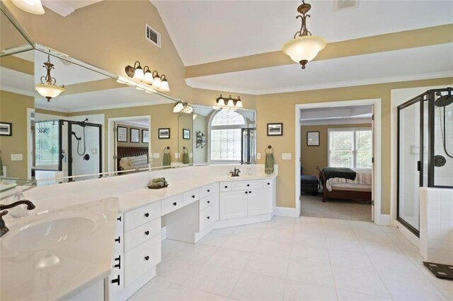 6317 Benbrooke Overlook NW, Acworth, GA 30101 - ensuite bathroom featuring double vanity, a stall shower, ornamental molding, and vaulted ceiling