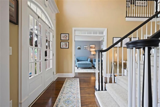 6317 Benbrooke Overlook NW, Acworth, GA 30101 - foyer featuring stairway, a high ceiling, and wood finished floors