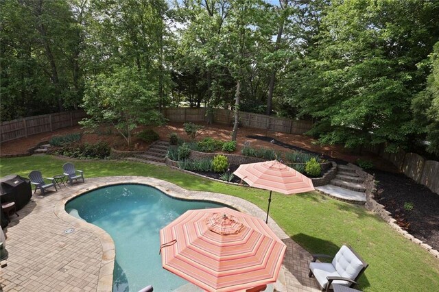 6317 Benbrooke Overlook NW, Acworth, GA 30101 - view of pool featuring a fenced backyard, a patio, and view of wooded area