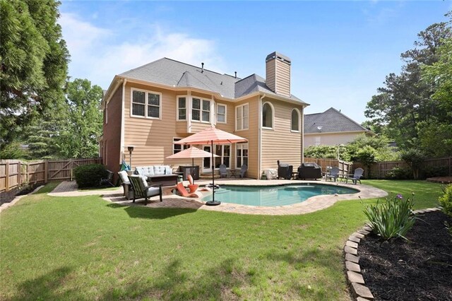6317 Benbrooke Overlook NW, Acworth, GA 30101 - rear view of property with an outdoor living space, a chimney, a fenced backyard, and a patio