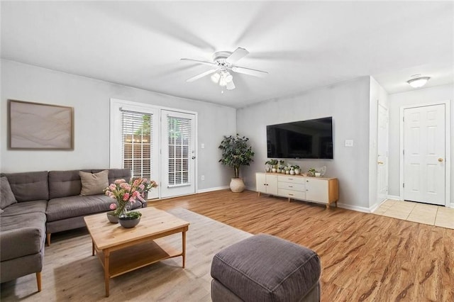 106 Brighton Pt, Sandy Springs, GA 30328 - living room featuring a ceiling fan and light wood finished floors