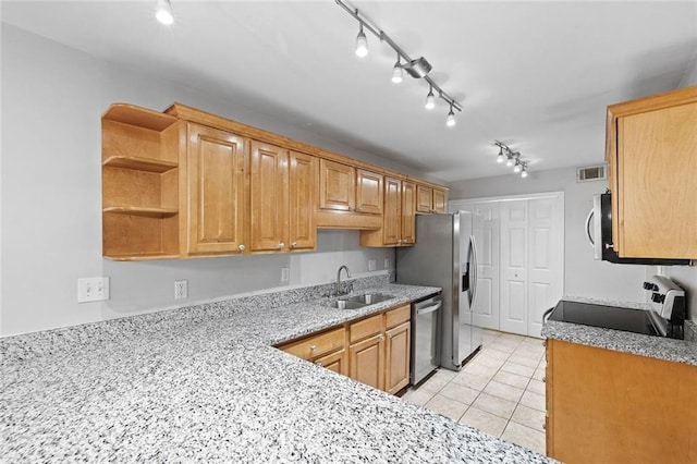106 Brighton Pt, Sandy Springs, GA 30328 - kitchen with stainless steel appliances, light tile patterned flooring, rail lighting, light stone countertops, and open shelves