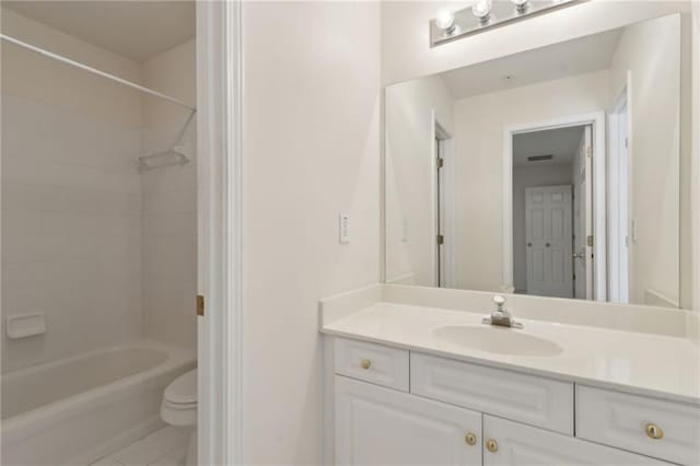 full bath with vanity, tile patterned flooring, toilet, and shower / tub combination