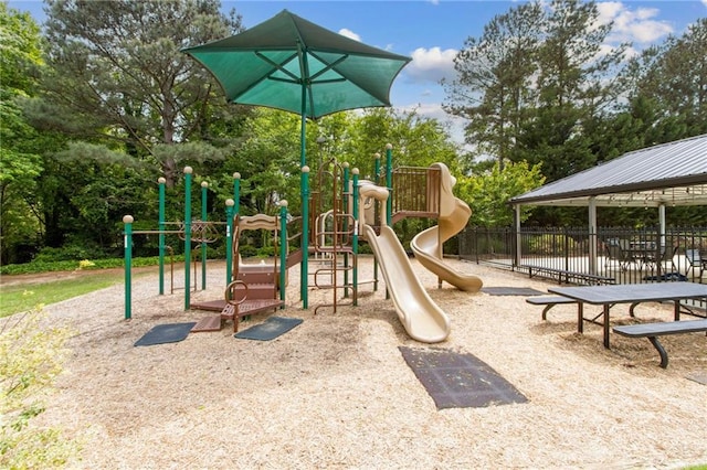community play area with fence and a gazebo