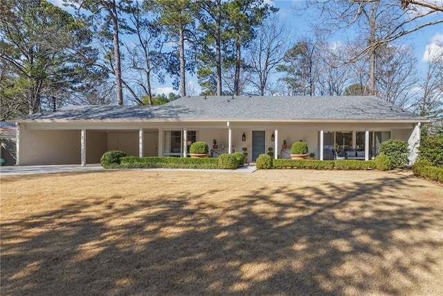 ranch-style house with a front yard