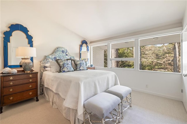 carpeted bedroom with baseboards