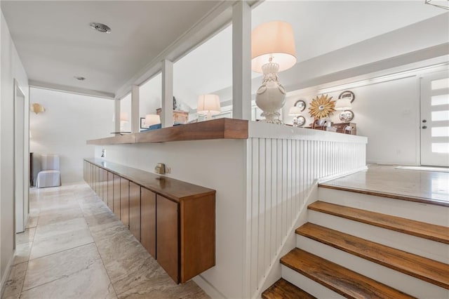 interior space featuring marble finish floor