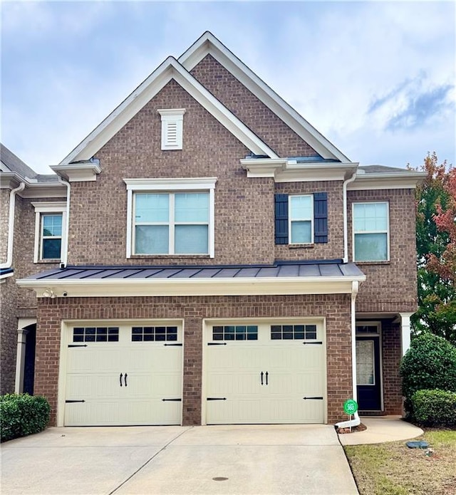 view of front of property featuring a garage