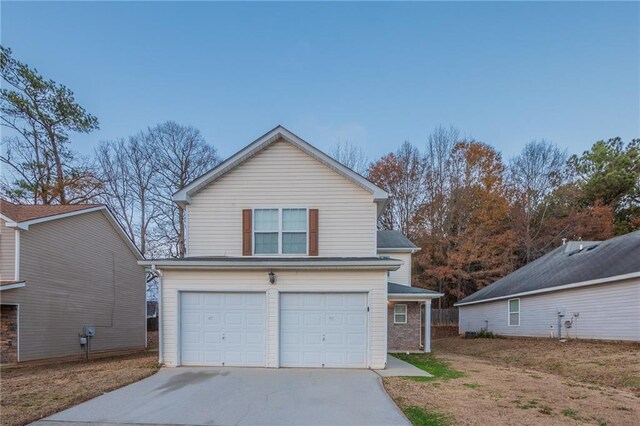 view of front of property featuring a garage