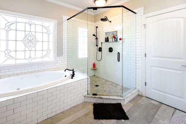 109 Lighthorse Blvd, Mcdonough, GA 30252 - bathroom featuring a bath, a shower stall, ornamental molding, and tile patterned flooring