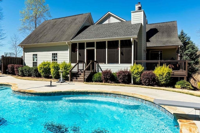 109 Lighthorse Blvd, Mcdonough, GA 30252 - swimming pool featuring a sunroom and a diving board