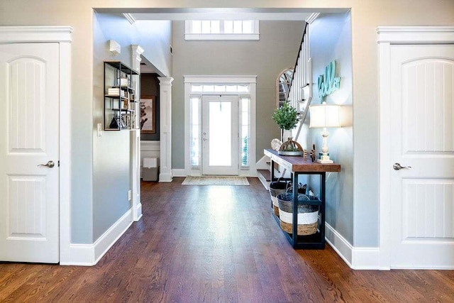 109 Lighthorse Blvd, Mcdonough, GA 30252 - entryway with baseboards, dark wood finished floors, and ornate columns
