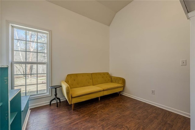 sitting room with vaulted ceiling, wood finished floors, and baseboards