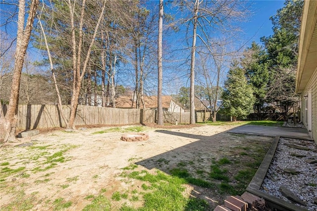 view of yard featuring a patio and a fenced backyard