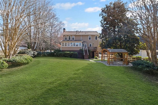 view of yard featuring stairway and a wooden deck