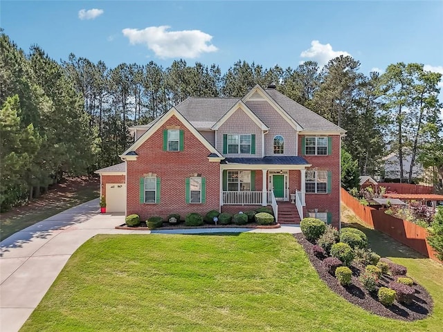 1829 Alcovy Shoals Blf, Lawrenceville, GA 30045 - view of front of house with a porch, driveway, and brick siding