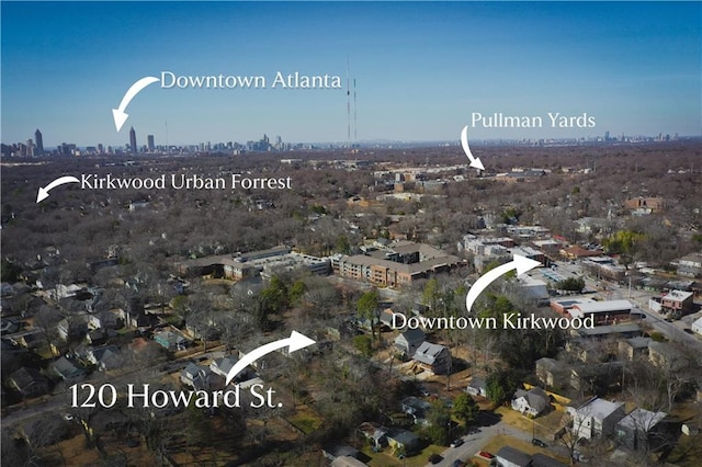 birds eye view of property featuring a city view