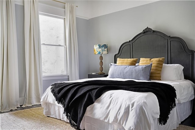 bedroom with multiple windows