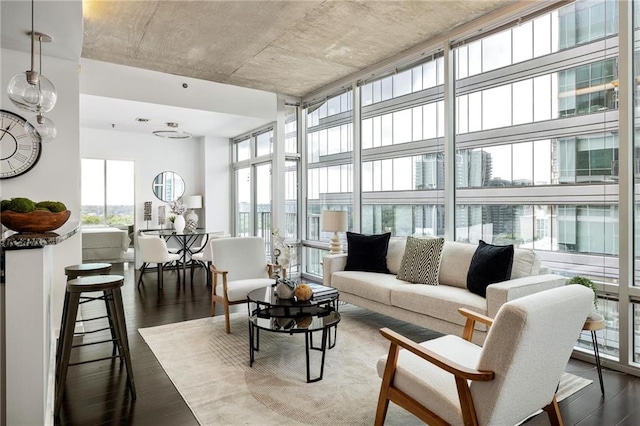 923 Peachtree St NE Unit 1238, Atlanta, GA 30309 - living room with dark wood-style floors and expansive windows