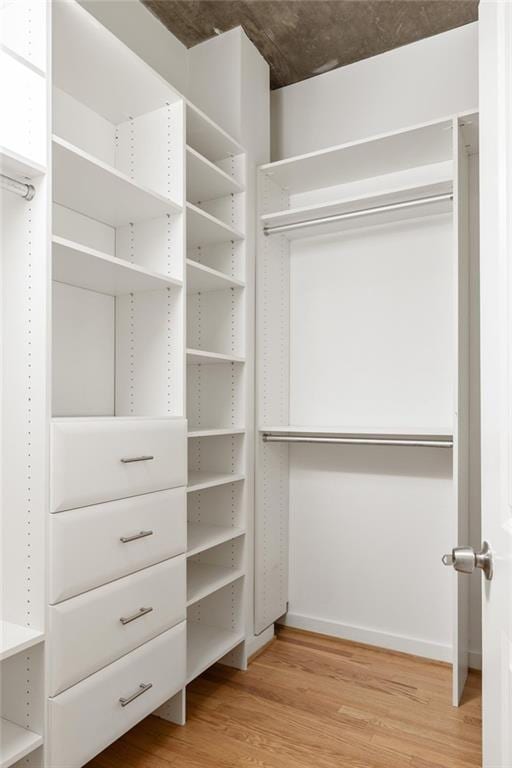 923 Peachtree St NE Unit 1238, Atlanta, GA 30309 - spacious closet featuring light wood-style flooring