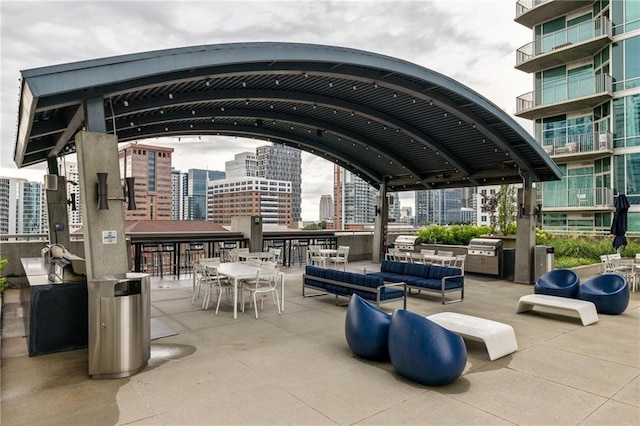 923 Peachtree St NE Unit 1238, Atlanta, GA 30309 - view of community with a view of city and an outdoor hangout area