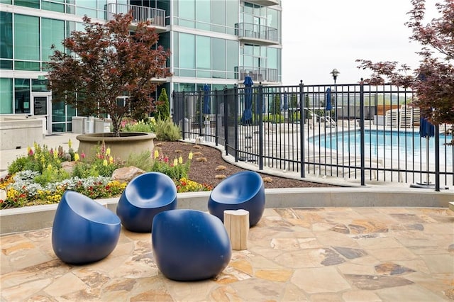 923 Peachtree St NE Unit 1238, Atlanta, GA 30309 - view of patio featuring a community pool