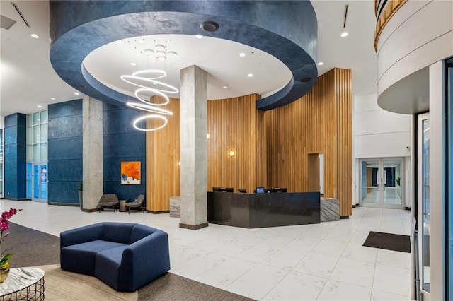 923 Peachtree St NE Unit 1238, Atlanta, GA 30309 - lobby featuring a towering ceiling and recessed lighting