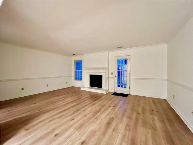 1271 Whitlock Ridge Dr SW, Marietta, GA 30064 - unfurnished living room featuring light wood-style floors and a fireplace with raised hearth
