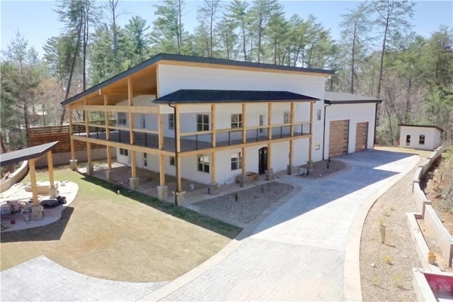300 Mountain Ridge Dr, Dahlonega, GA 30533 - exterior space with a patio, concrete driveway, a garage, and a deck