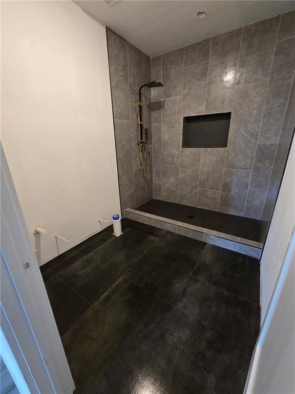 300 Mountain Ridge Dr, Dahlonega, GA 30533 - full bathroom featuring tile patterned floors and a tile shower