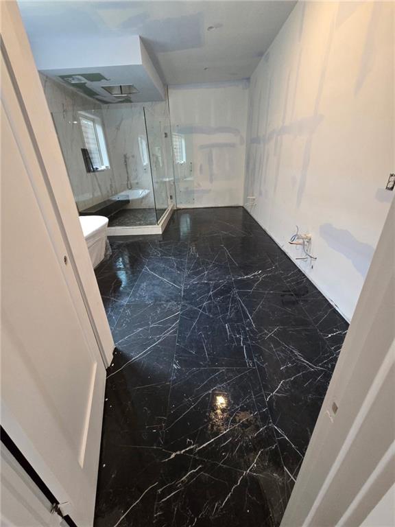 300 Mountain Ridge Dr, Dahlonega, GA 30533 - full bath featuring a marble finish shower, toilet, and marble finish floor