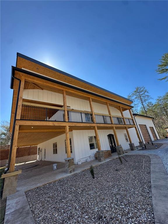300 Mountain Ridge Dr, Dahlonega, GA 30533 - back of house featuring a patio