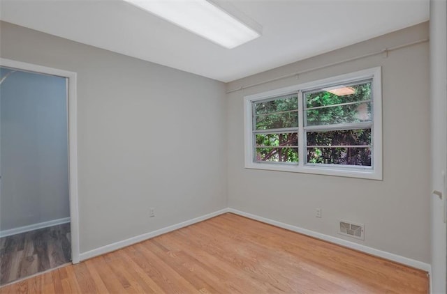 622 Sheffield Rd, Norcross, GA 30071 - empty room with baseboards and light wood-type flooring