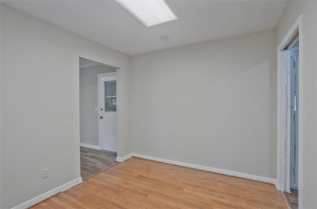 622 Sheffield Rd, Norcross, GA 30071 - empty room featuring light wood-style floors and baseboards