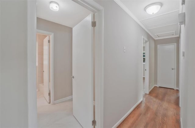 622 Sheffield Rd, Norcross, GA 30071 - corridor featuring baseboards, light wood-type flooring, and attic access