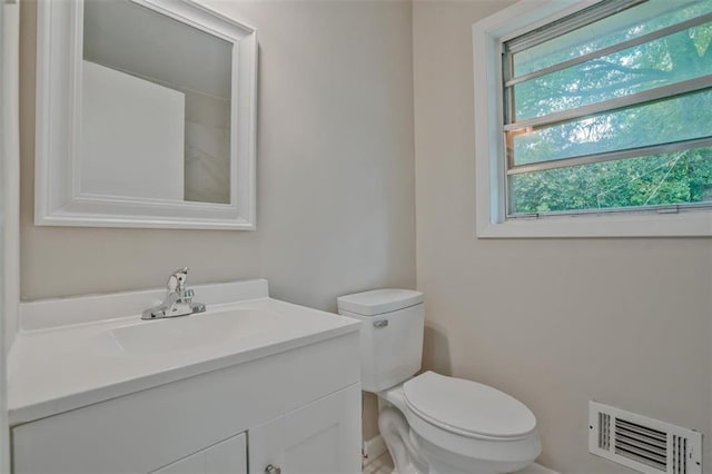 622 Sheffield Rd, Norcross, GA 30071 - bathroom featuring toilet, vanity, and baseboards