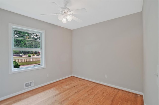 622 Sheffield Rd, Norcross, GA 30071 - spare room featuring baseboards, light wood-style floors, and a ceiling fan
