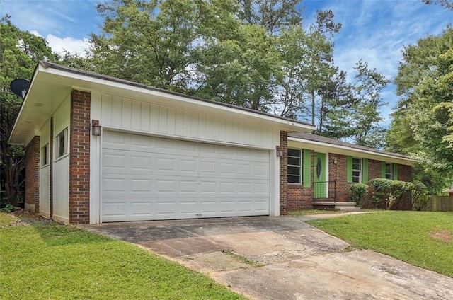 622 Sheffield Rd, Norcross, GA 30071 - view of front of home with brick siding, driveway, a front yard, and an attached garage