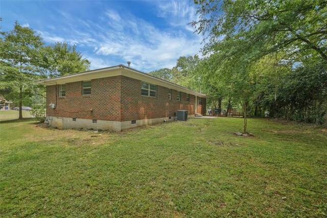 622 Sheffield Rd, Norcross, GA 30071 - view of home's exterior featuring crawl space, brick siding, and central air condition unit