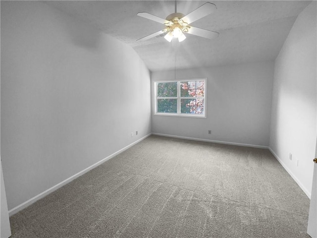 4279 Orchard Grv, Stone Mountain, GA 30083 - spare room featuring carpet, baseboards, a ceiling fan, and vaulted ceiling