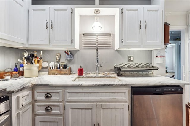 kitchen featuring dishwasher, white cabinetry, and decorative light fixtures