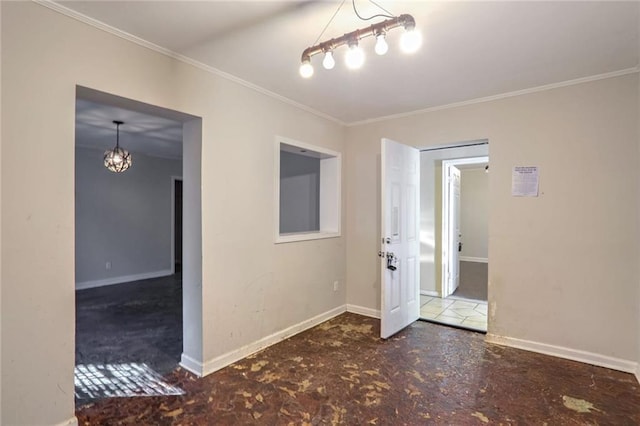 spare room featuring ornamental molding